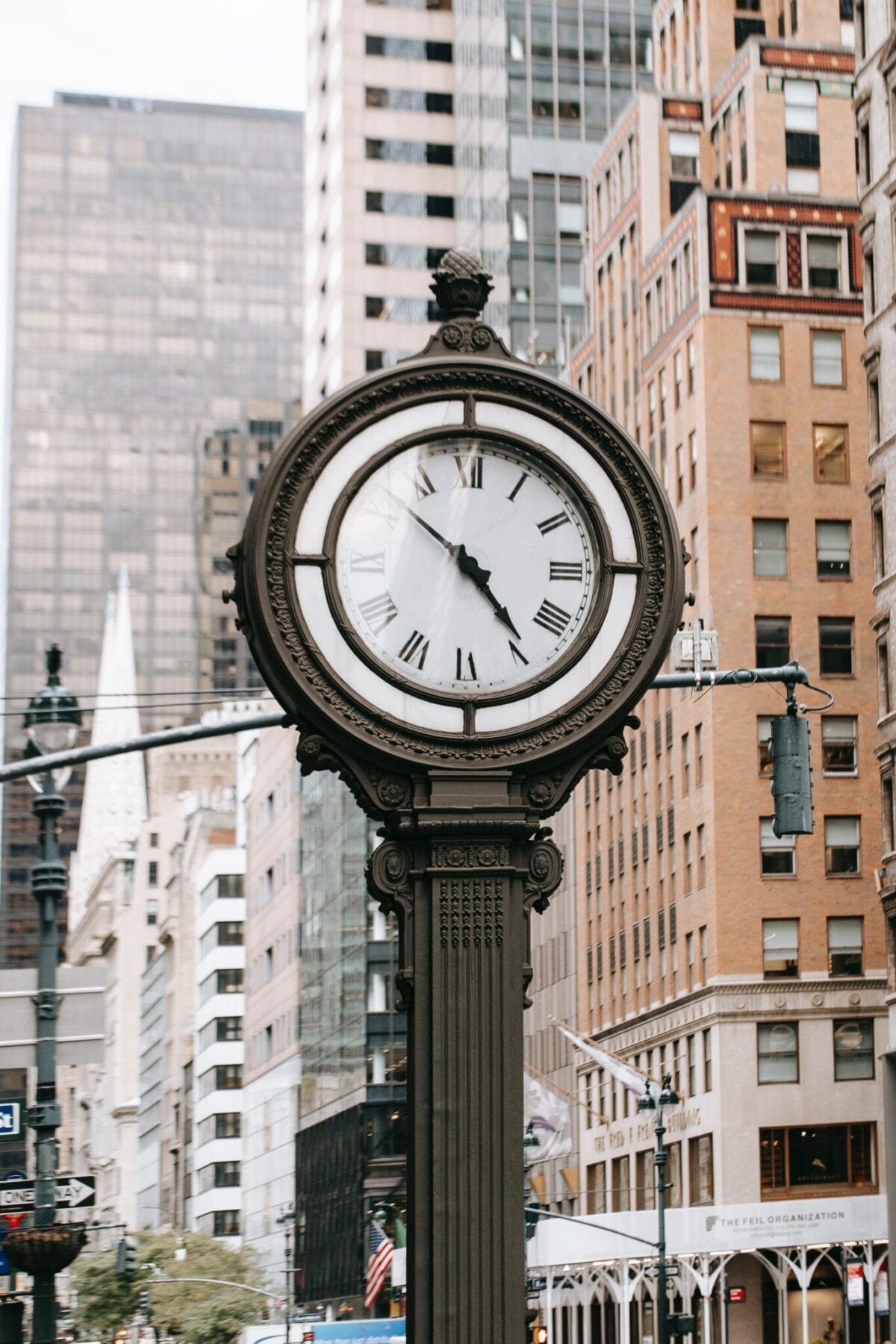 Vintage clock in city on street