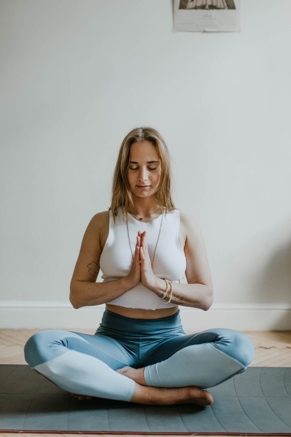 girl manifesting by meditating