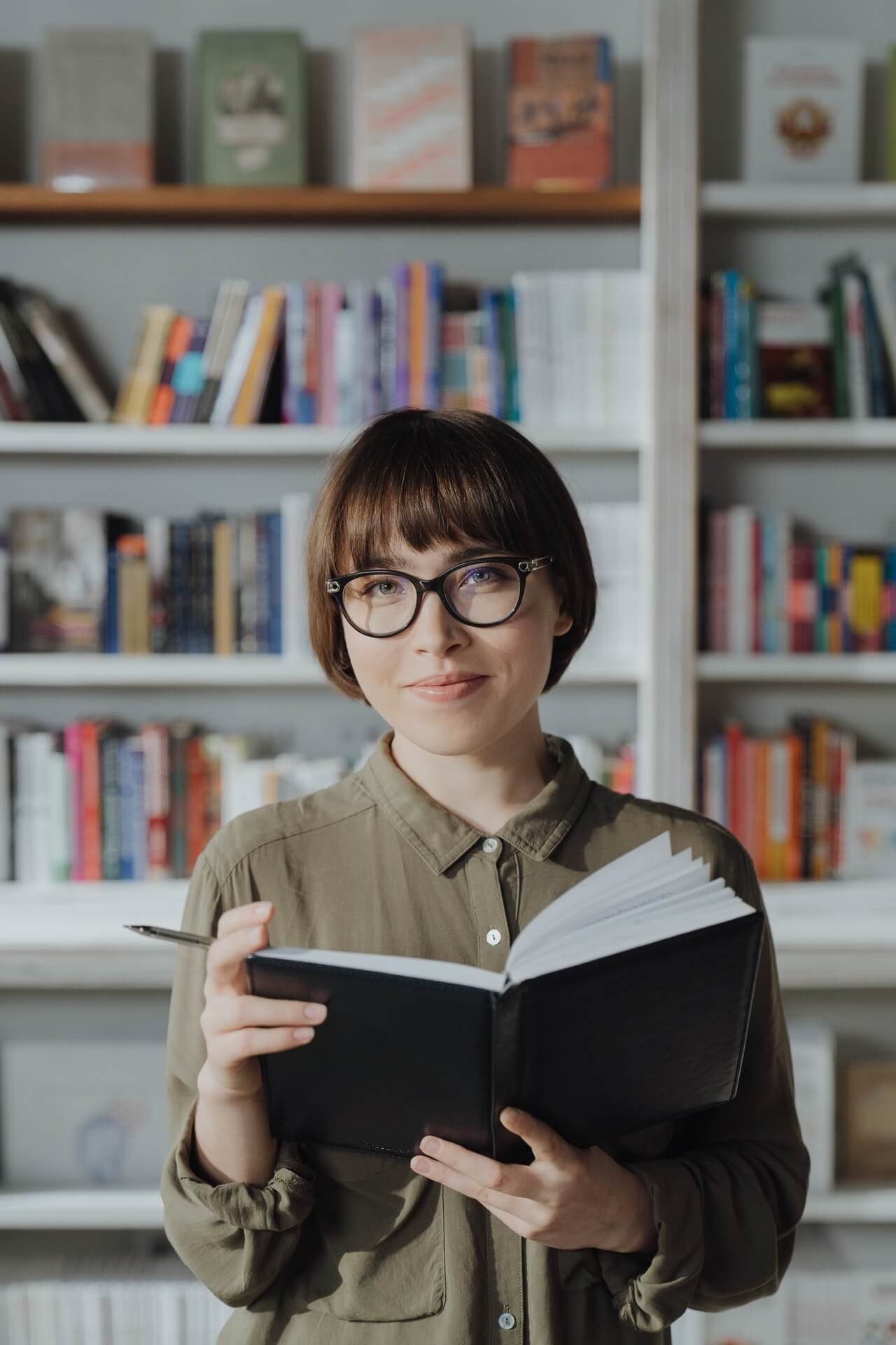 girl holding a book