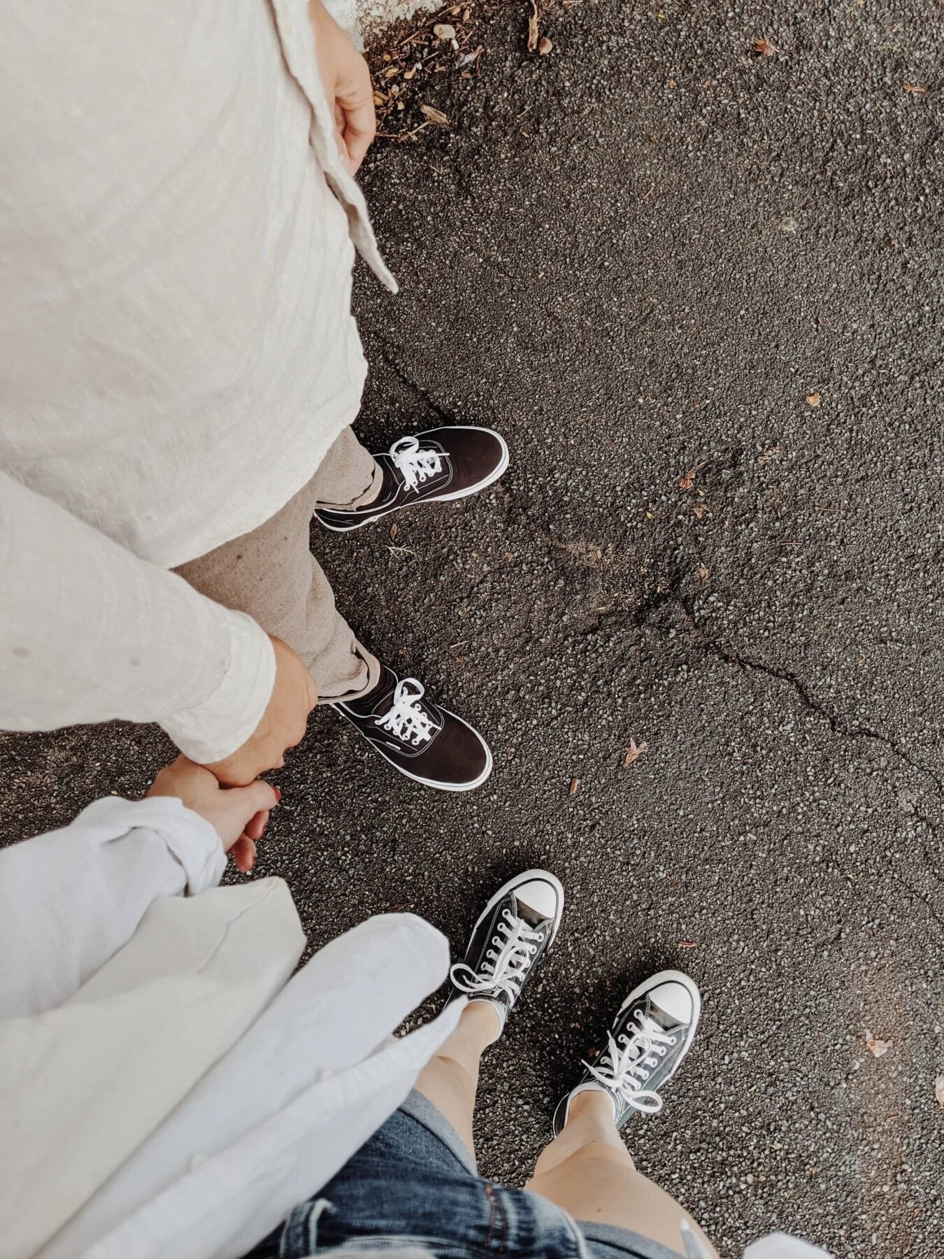 People in Black and White Sneakers