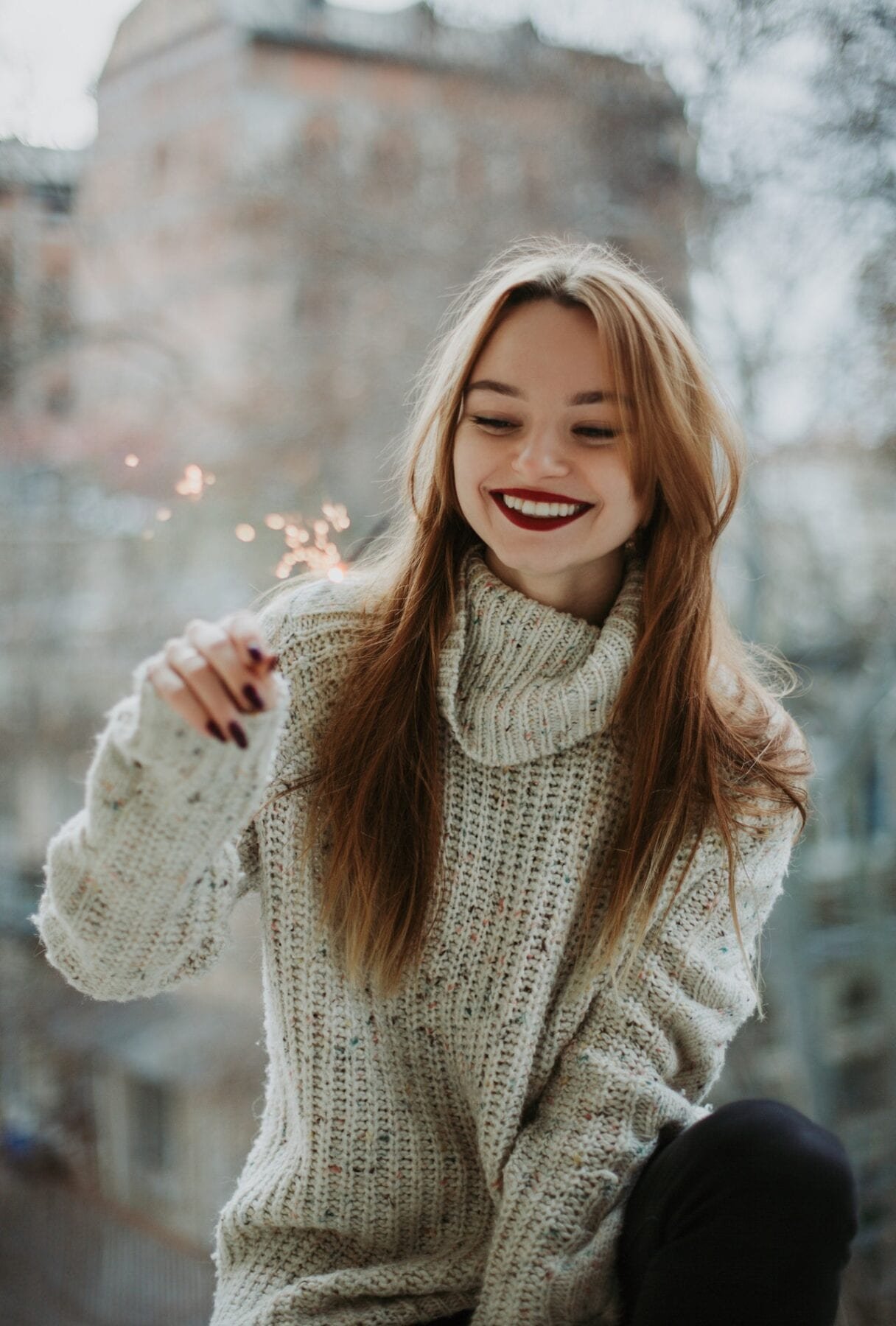 woman holding sparkler