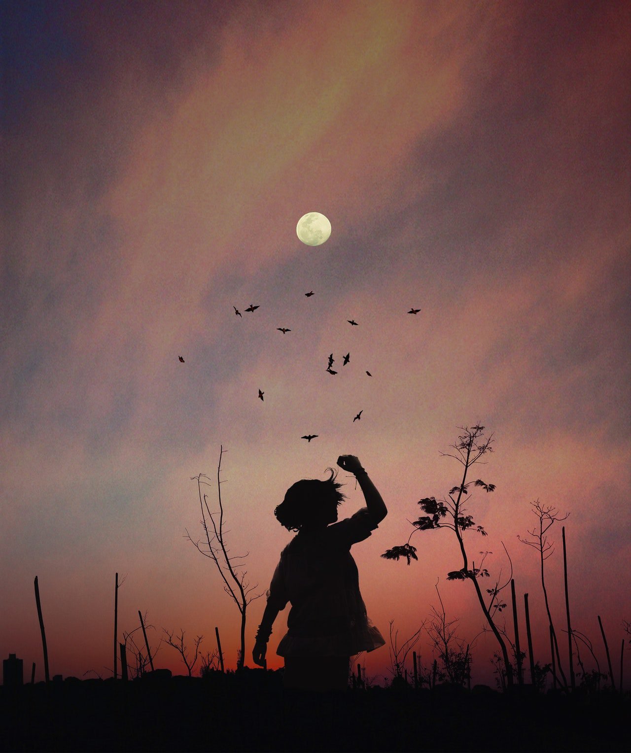 girl dancing under the full moon