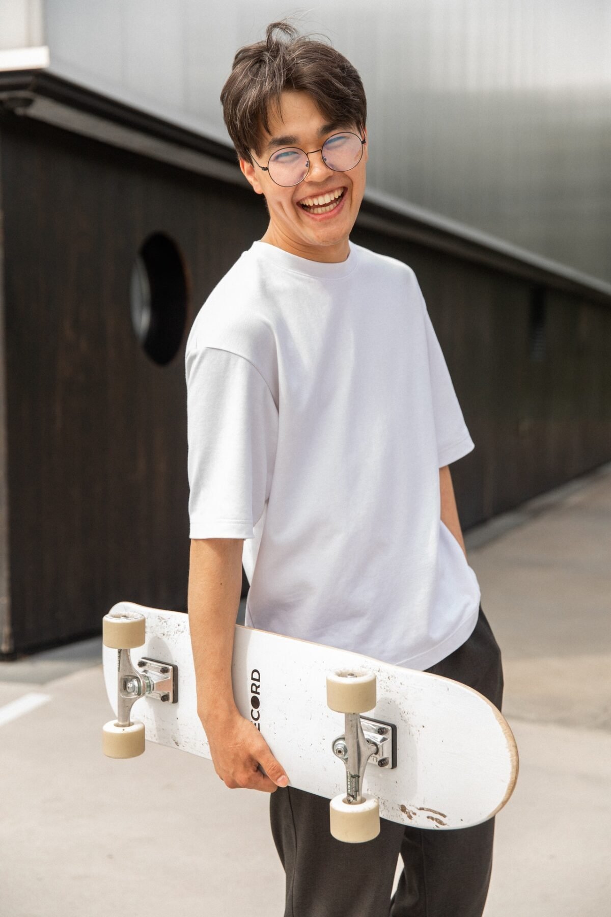 man holding a skateboard
