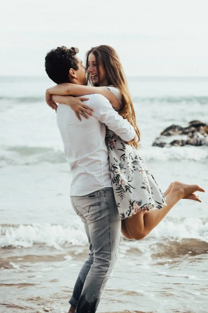 man and woman hugging