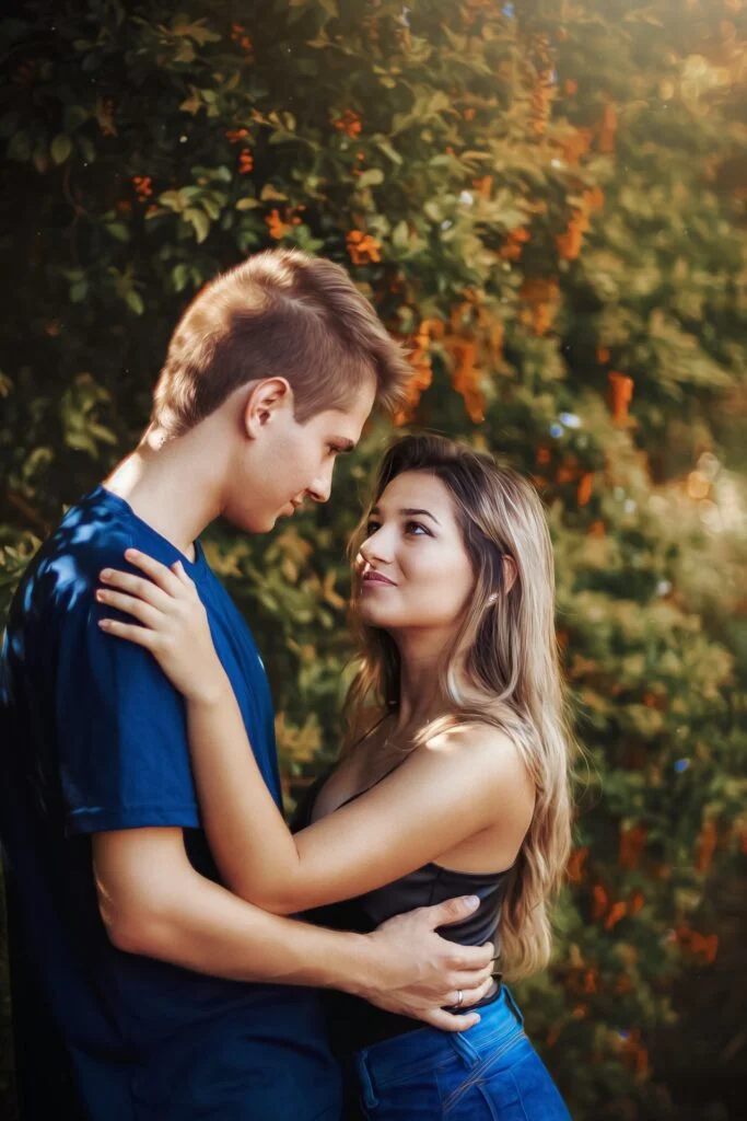 man and woman hugging